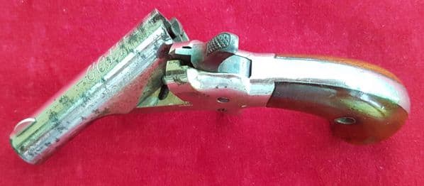 A scarce Colt no 3 nickel plated .41 rim-fire single-shot derringer. Circa 1875. Ref 1459.